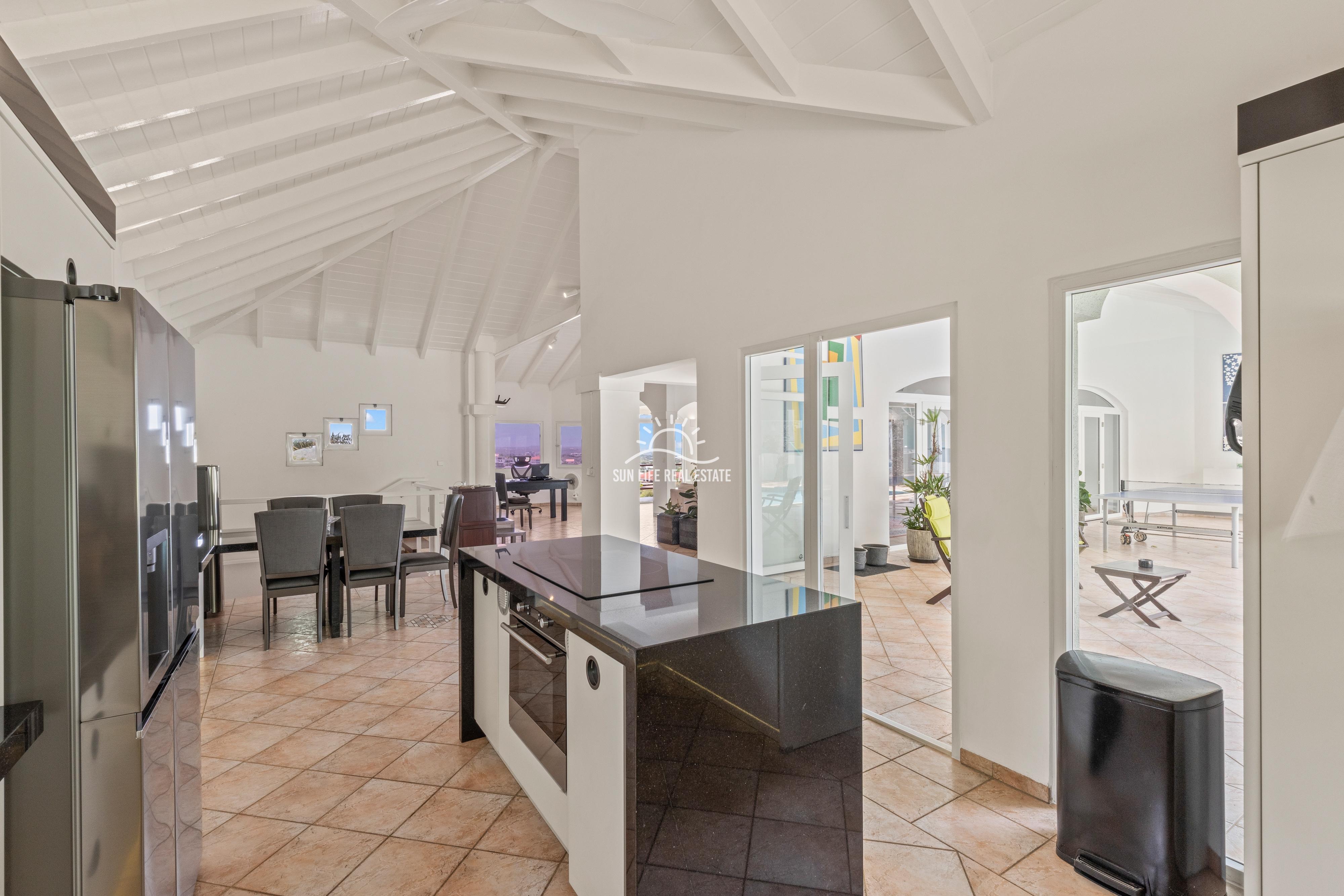 Elevated Renovated Villa with Panoramic Views For Sale in Jan Thiel