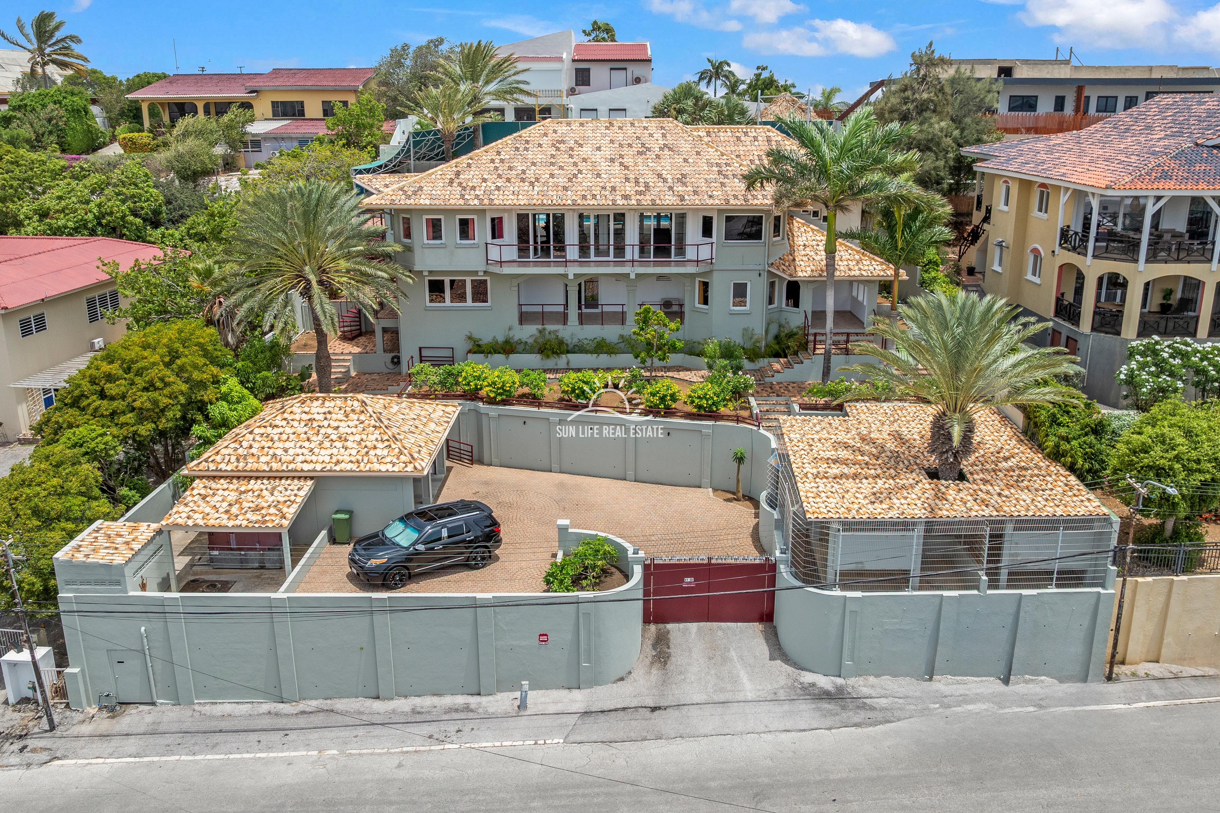 Elevated Renovated Villa with Panoramic Views For Sale in Jan Thiel