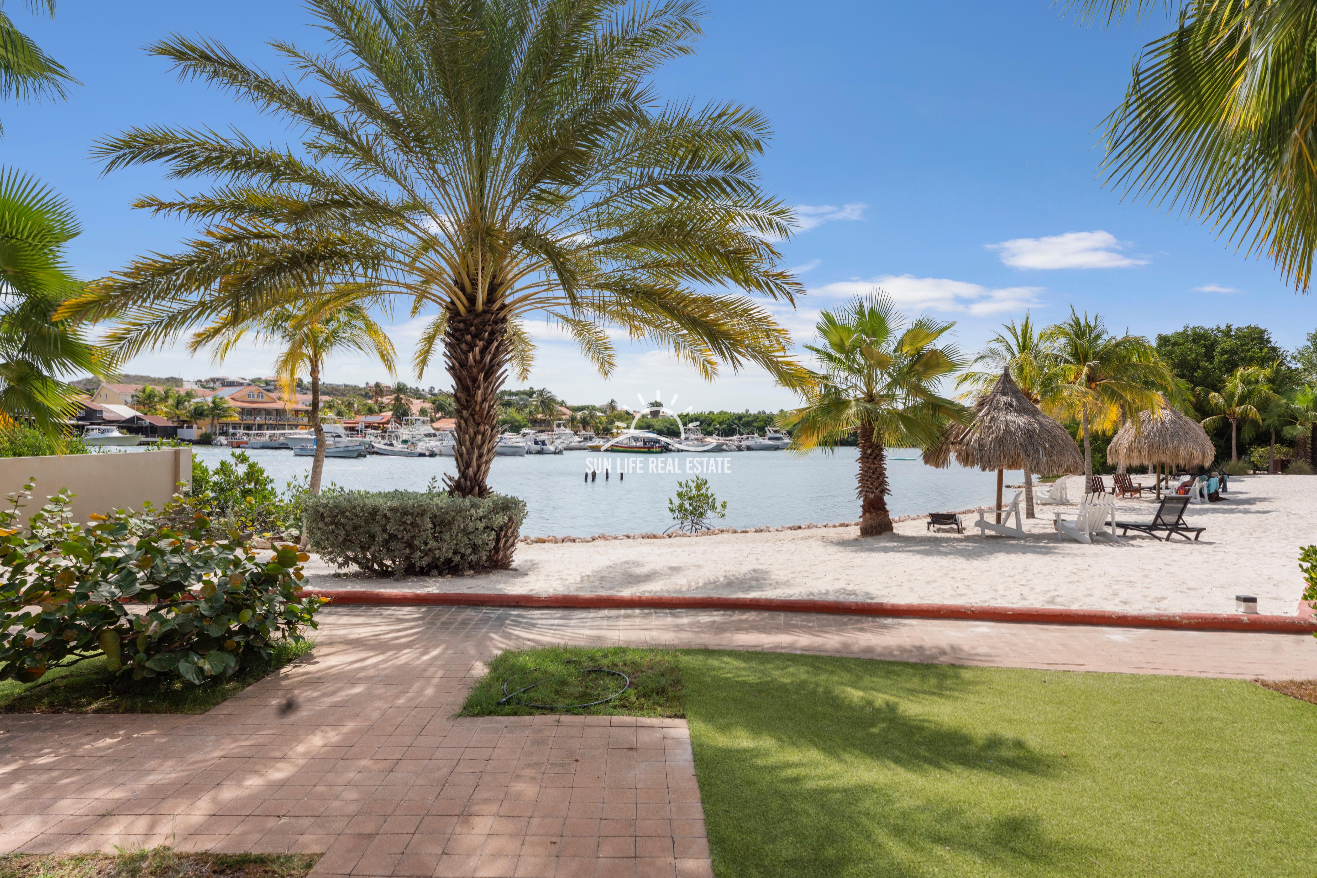 Waterfront Apartment with Private Beach  for Sale on Spanish Water Resort