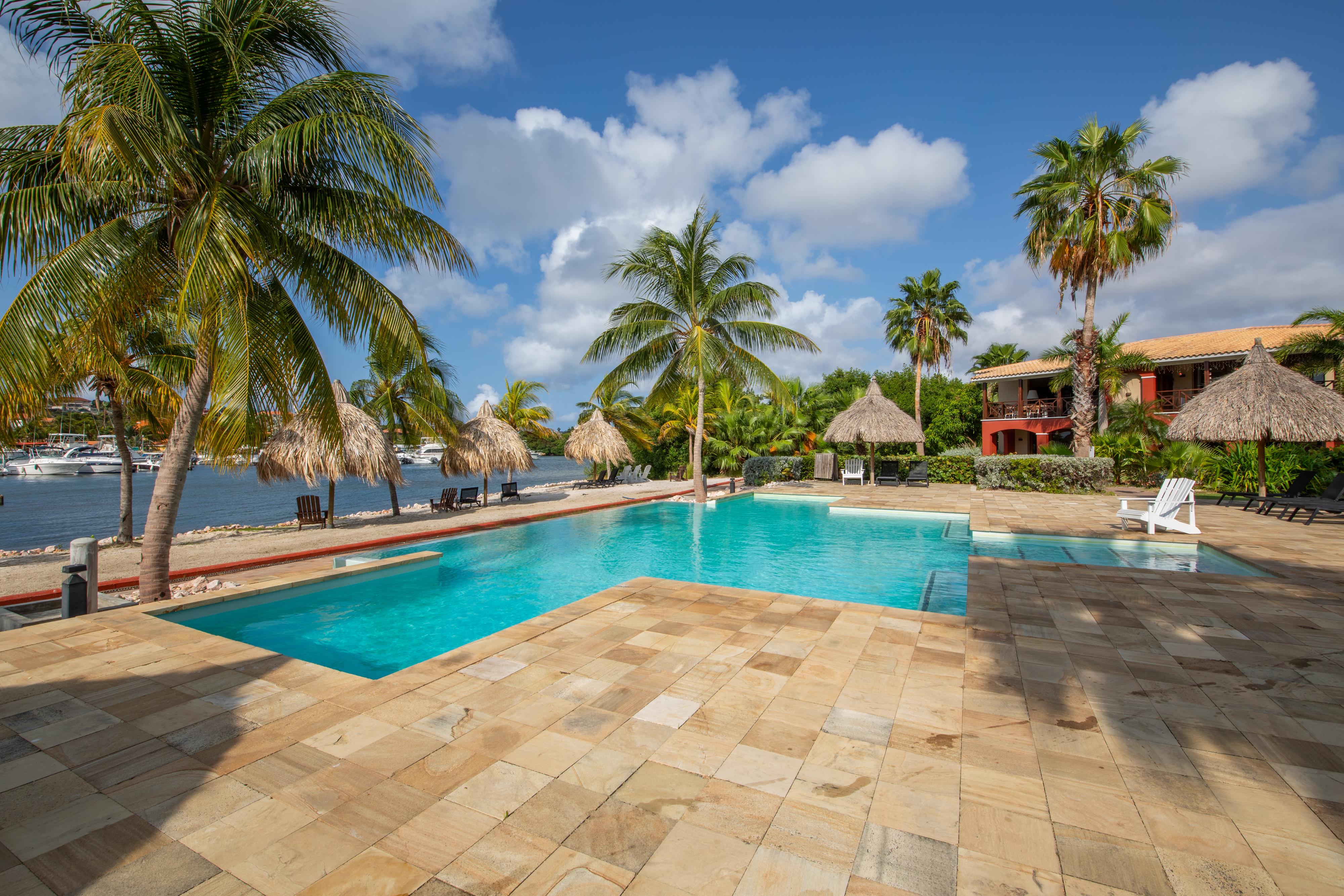 Waterfront Apartment with Private Beach  for Sale on Spanish Water Resort